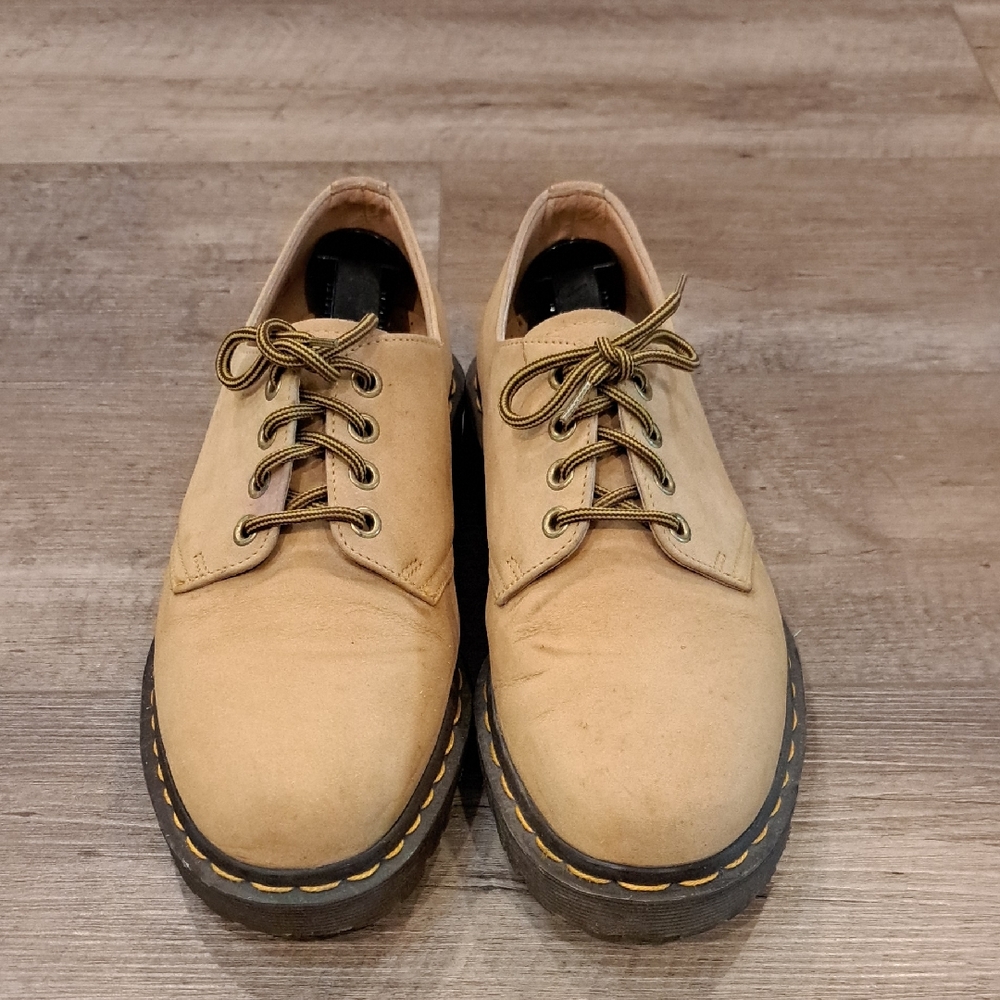 Dr. Martens Classic Tan and Black Oxfords with Sleek Lace-Up Design